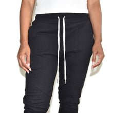 John Elliott Women's Escobar Black Sweatpants on Well(un)known. Available at wellunknown.com